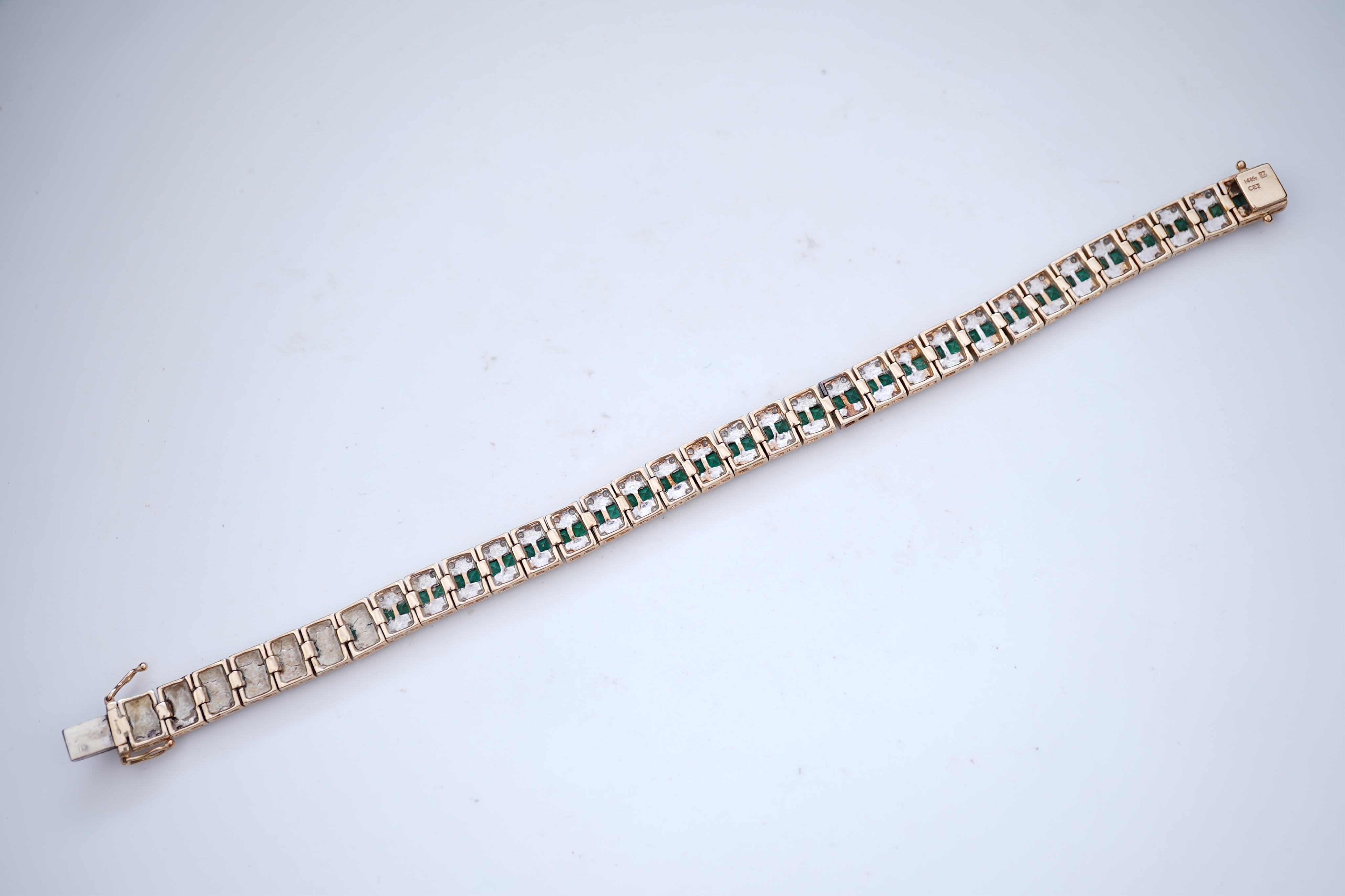 An emerald and diamond bracelet